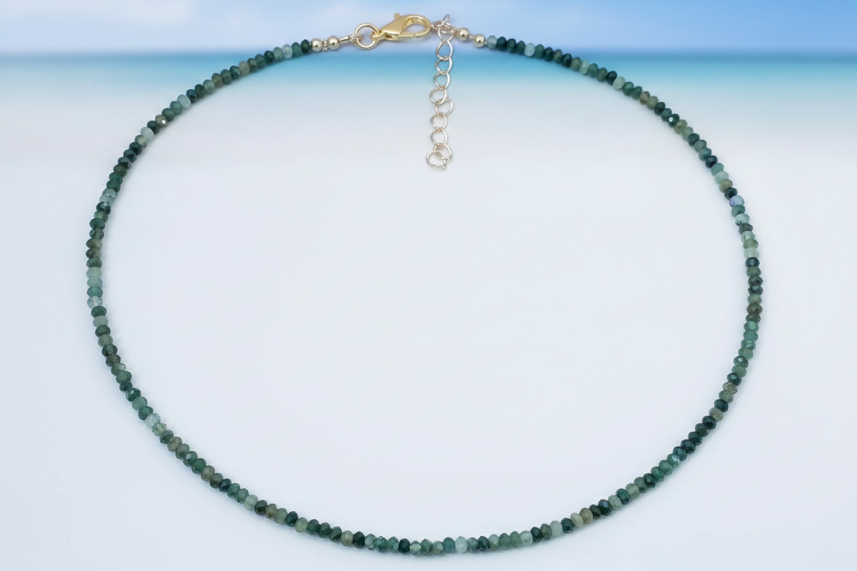 Delicate faceted emerald green and dark teal gemstone rondelle bead necklace with gold lobster clasp